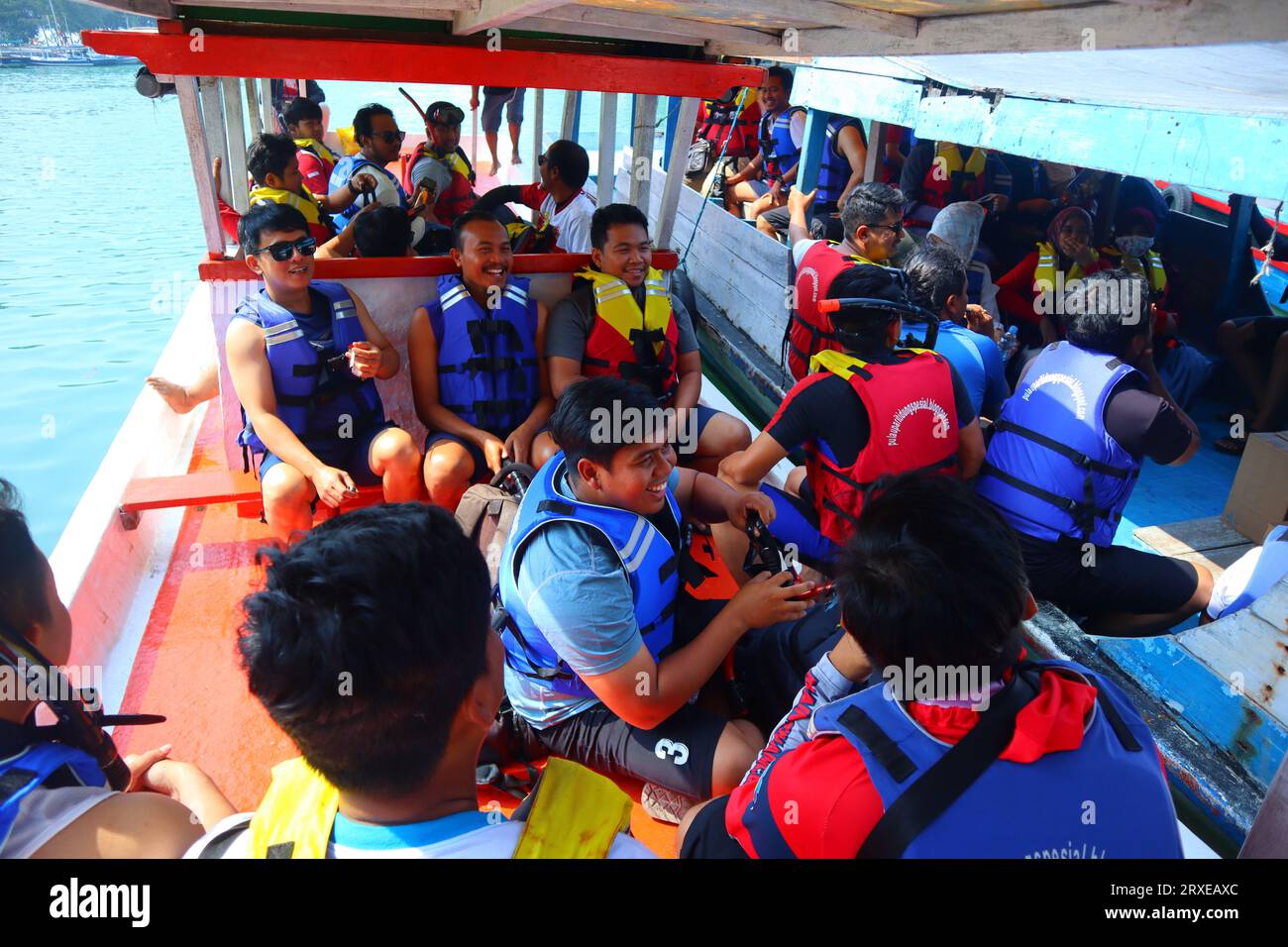 Jakarta, Indonesia - August 12, 2023 : Prepare to go to the snorkeling area by boat. Many people. Vacation at sea. Stock Photo