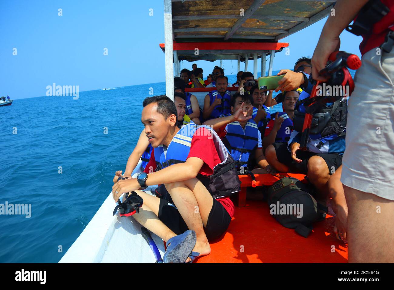 Jakarta, Indonesia - August 12, 2023 : Prepare to go to the snorkeling area by boat. Many people. Vacation at sea. Stock Photo