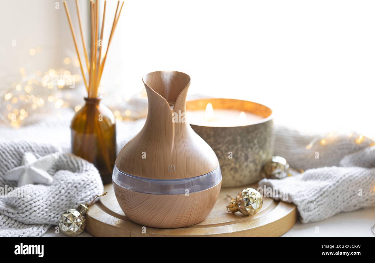 Still life with an aroma diffuser for moisturizing the air and winter ...