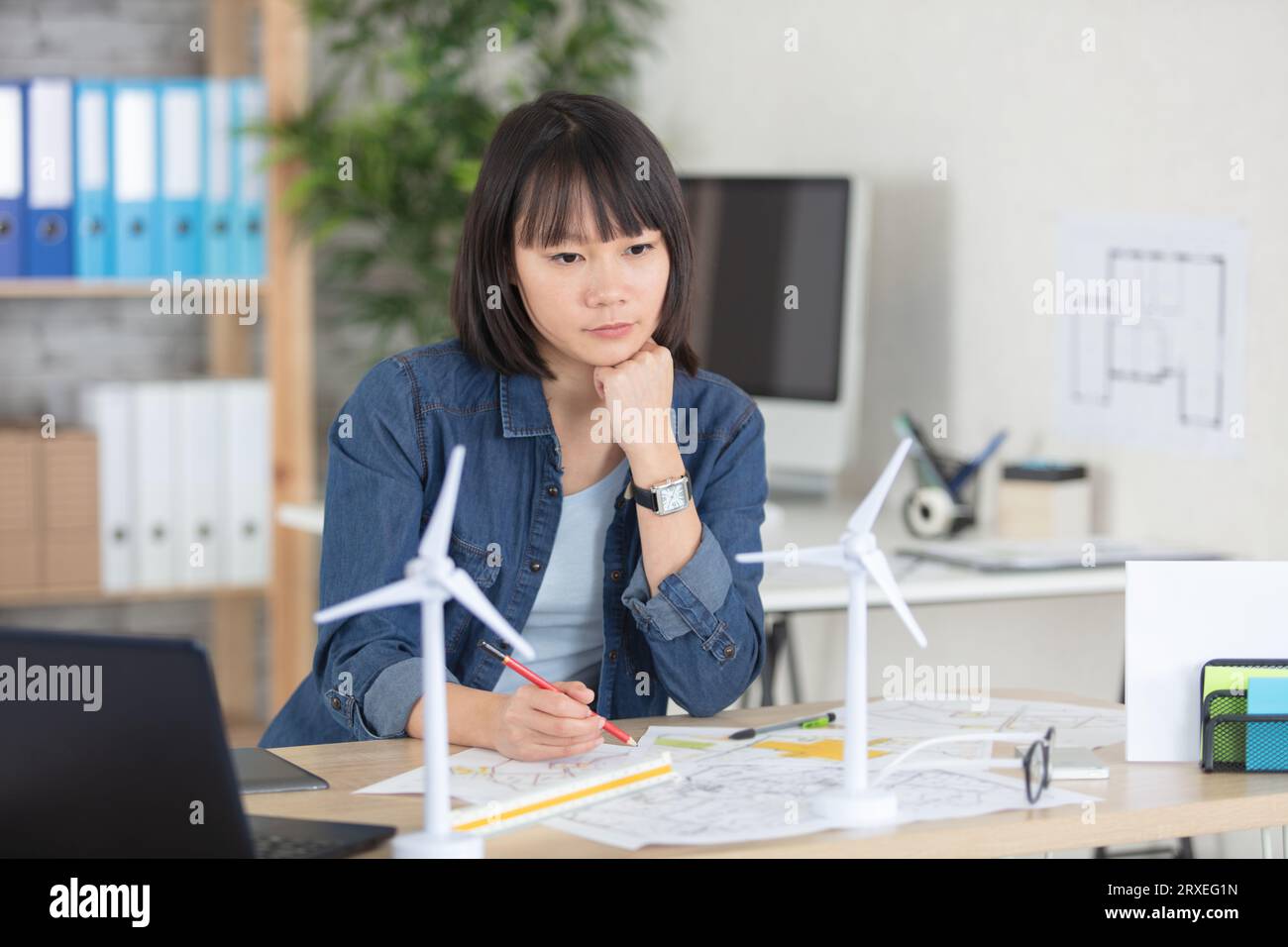 female architect working at home Stock Photo