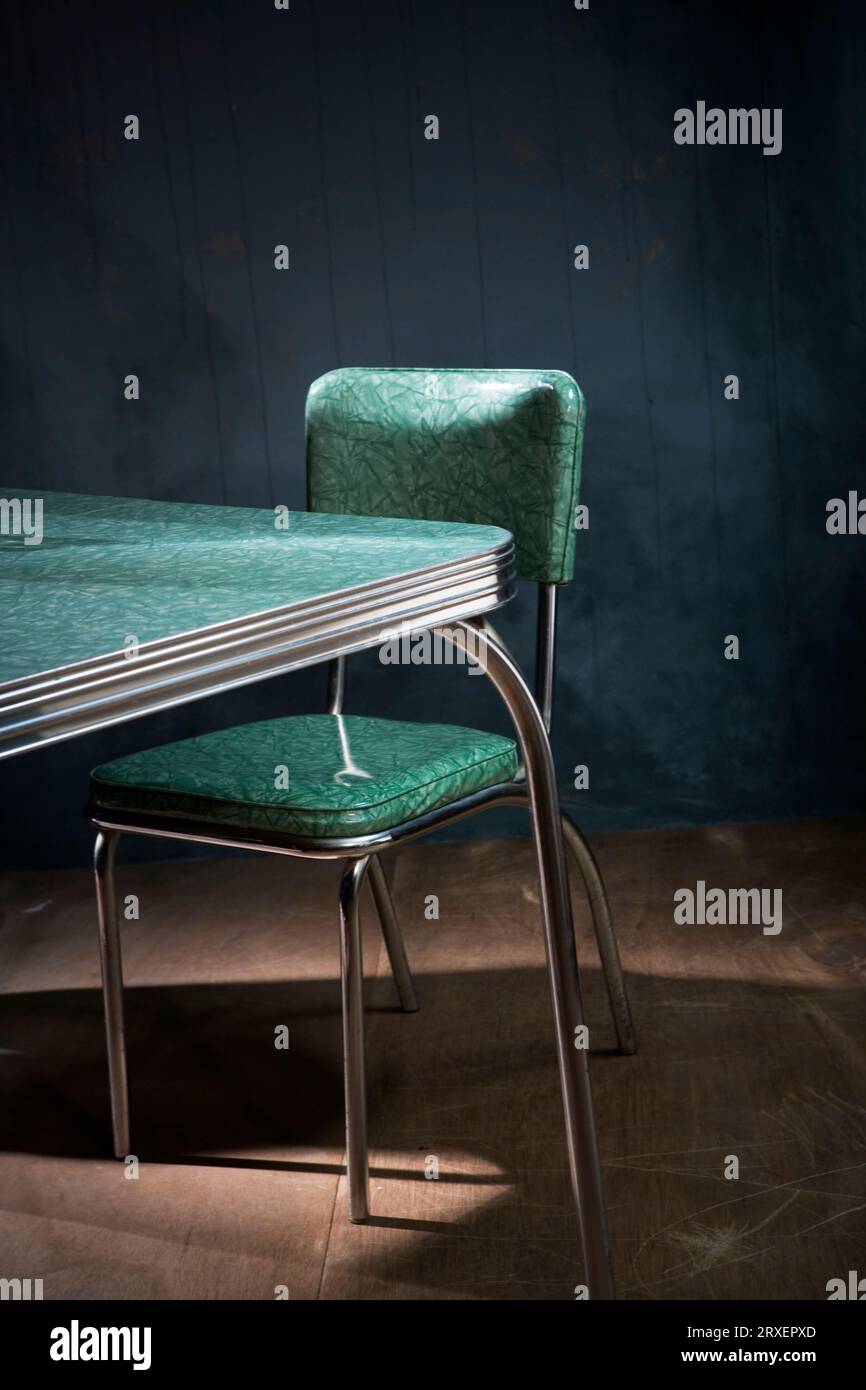 Empty table and chair Stock Photo - Alamy