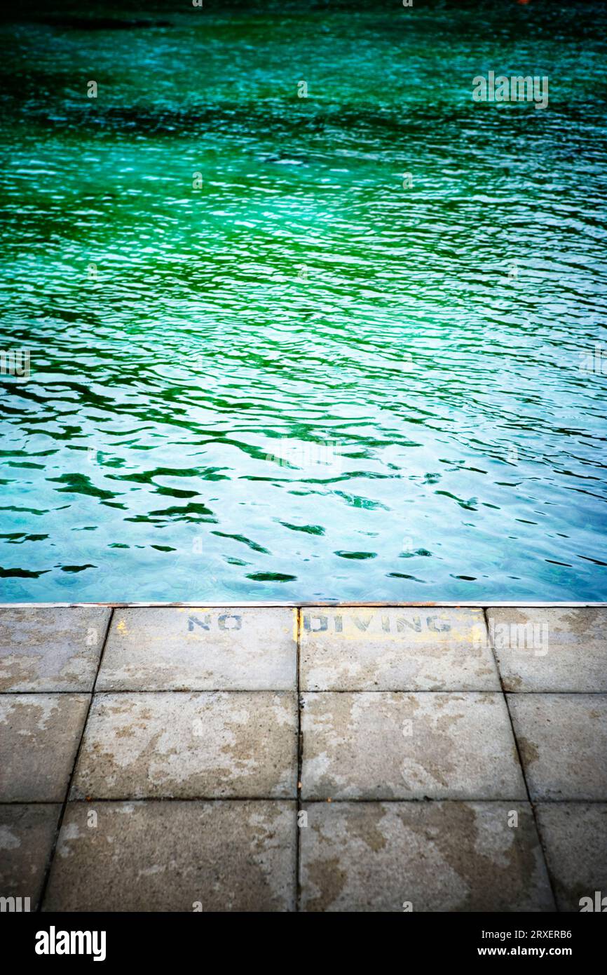 Empty pier and river water Stock Photo - Alamy