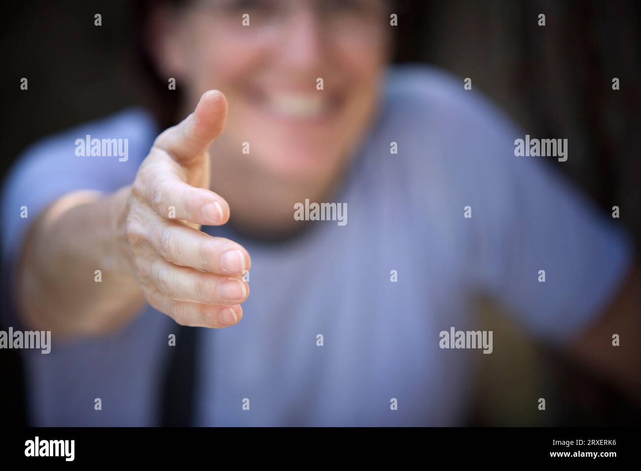 Woman reaching hand camera hi-res stock photography and images - Alamy