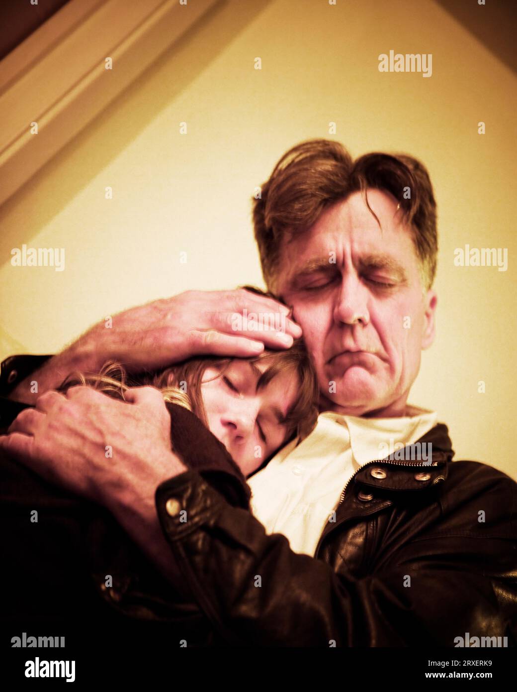 A woman being comforted by a man. Stock Photo