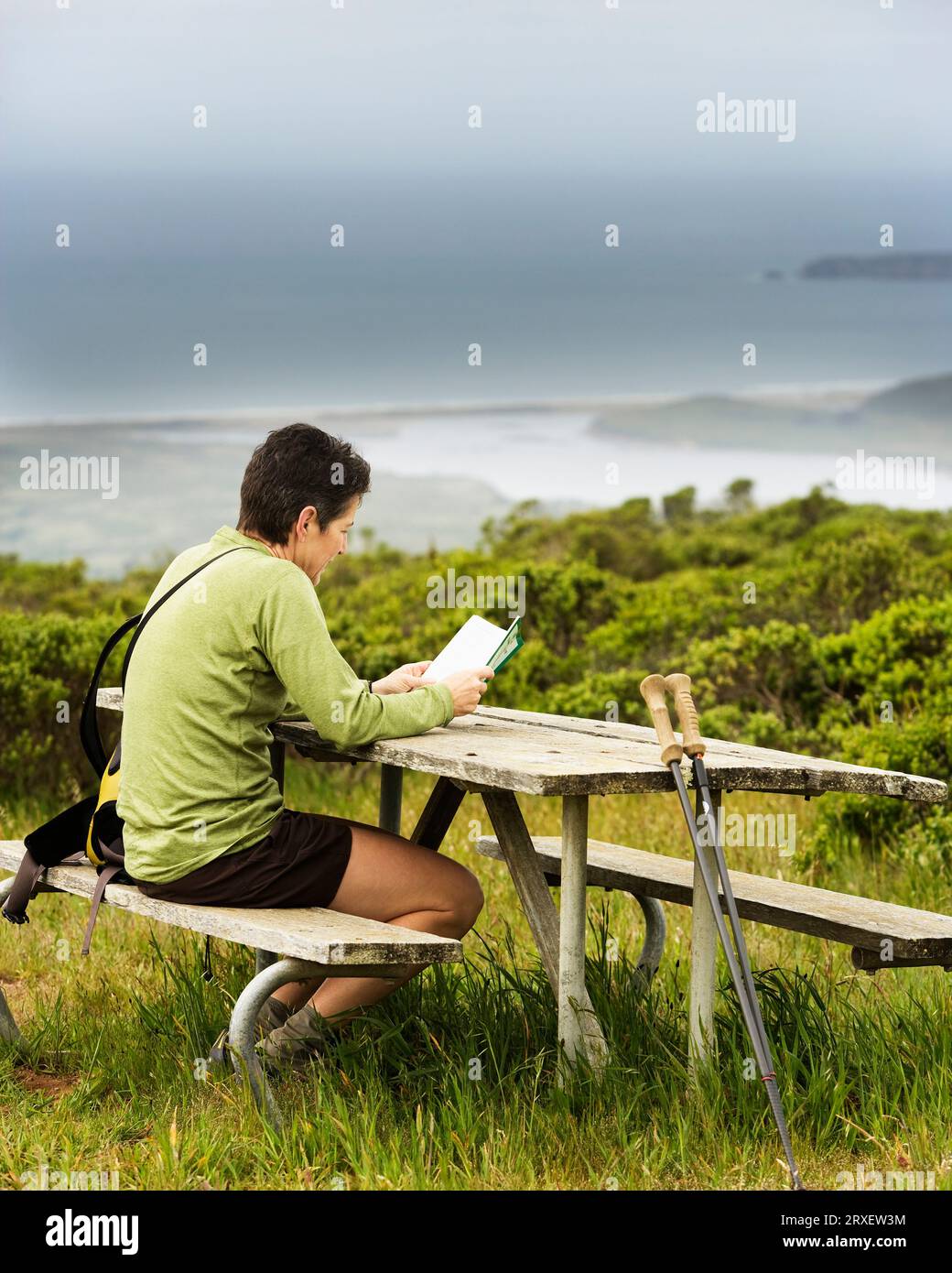 Reading book outdoors hill hi-res stock photography and images - Alamy