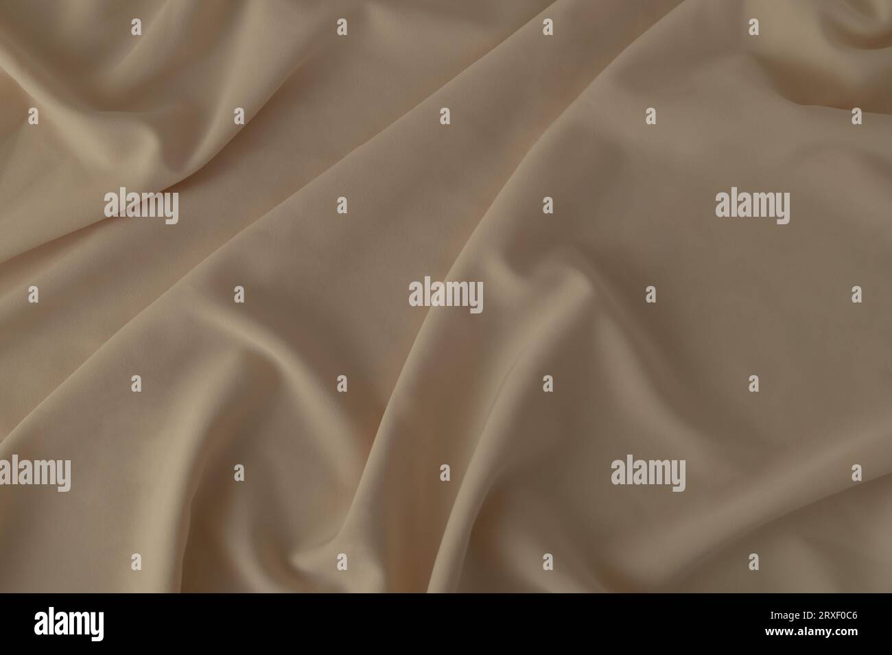 Modern silk fabric background. Minimal concept. Neutral design. Flat lay, top of view. Stock Photo