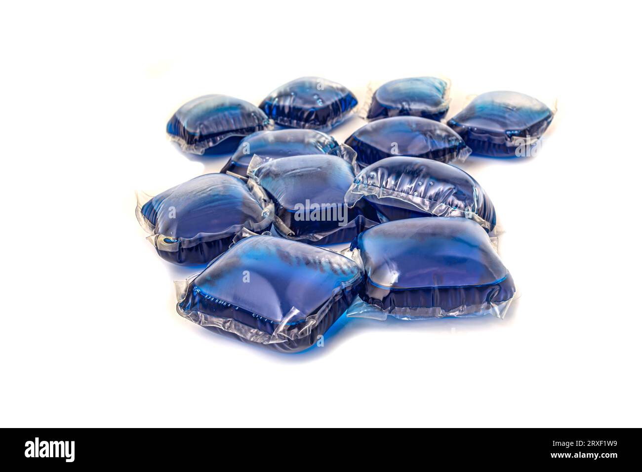 square capsules with blue washing gel on a white background. High quality photo Stock Photo