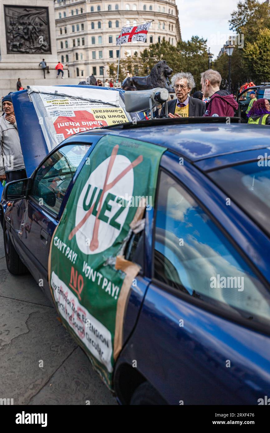 Anti ULEZ protester, Piers Corbyn parks his non compliant car in Trafalgar Square in London. Stock Photo