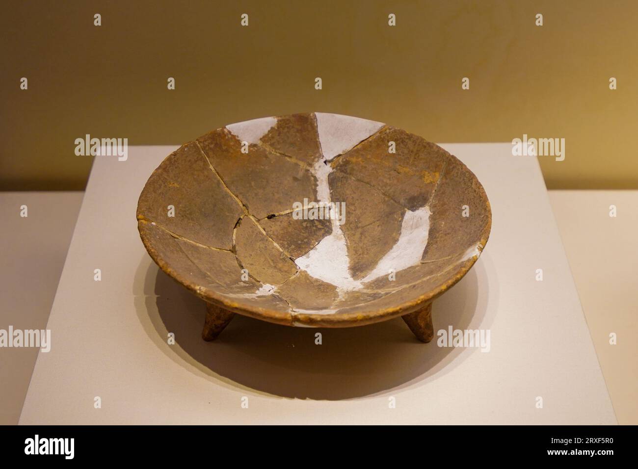 Beijing China, February 17, 2023 Three legged pottery bowl of Cishan