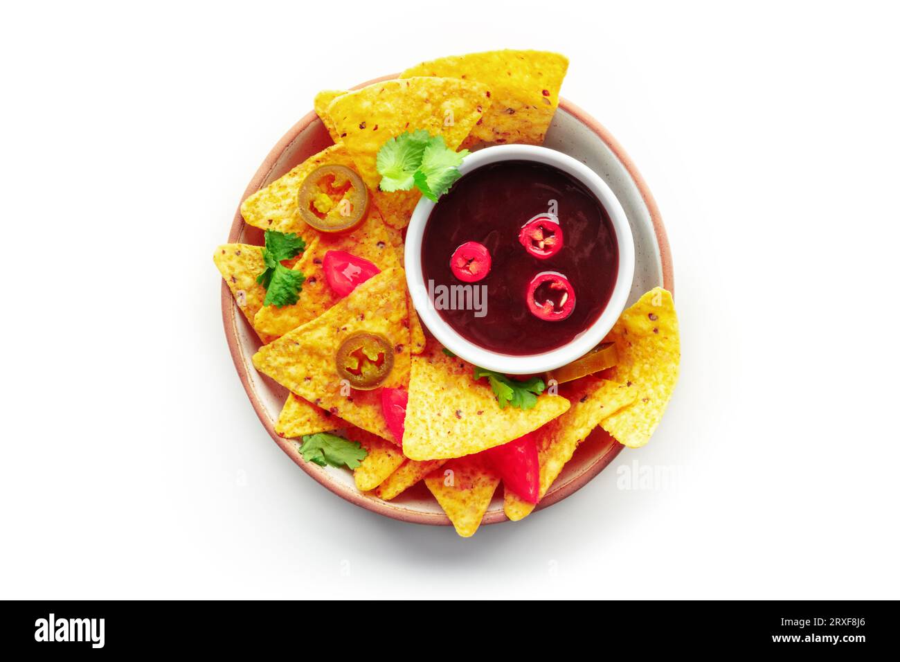 Spicy nachos. Mexican nacho chips, overhead flat lay shot with bbq