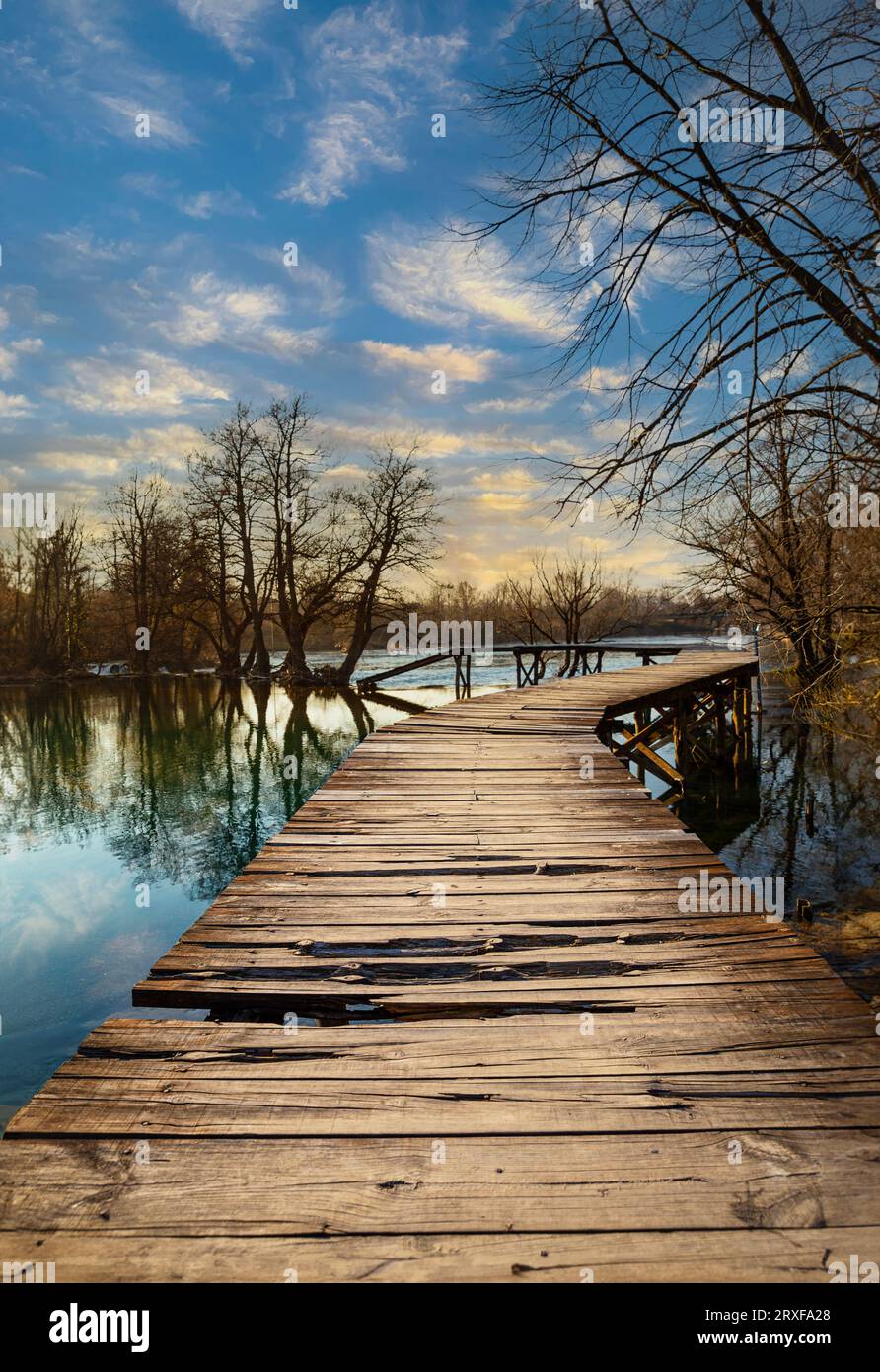 Wooden bridge over the river Una on the Brvice river beach in Town of Bihac Stock Photo