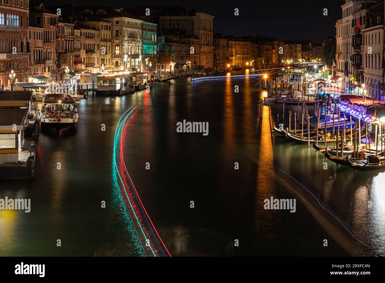 View of Grand Canal Venice at night, with gondolas, Venice Italy, long exposure Stock Photo