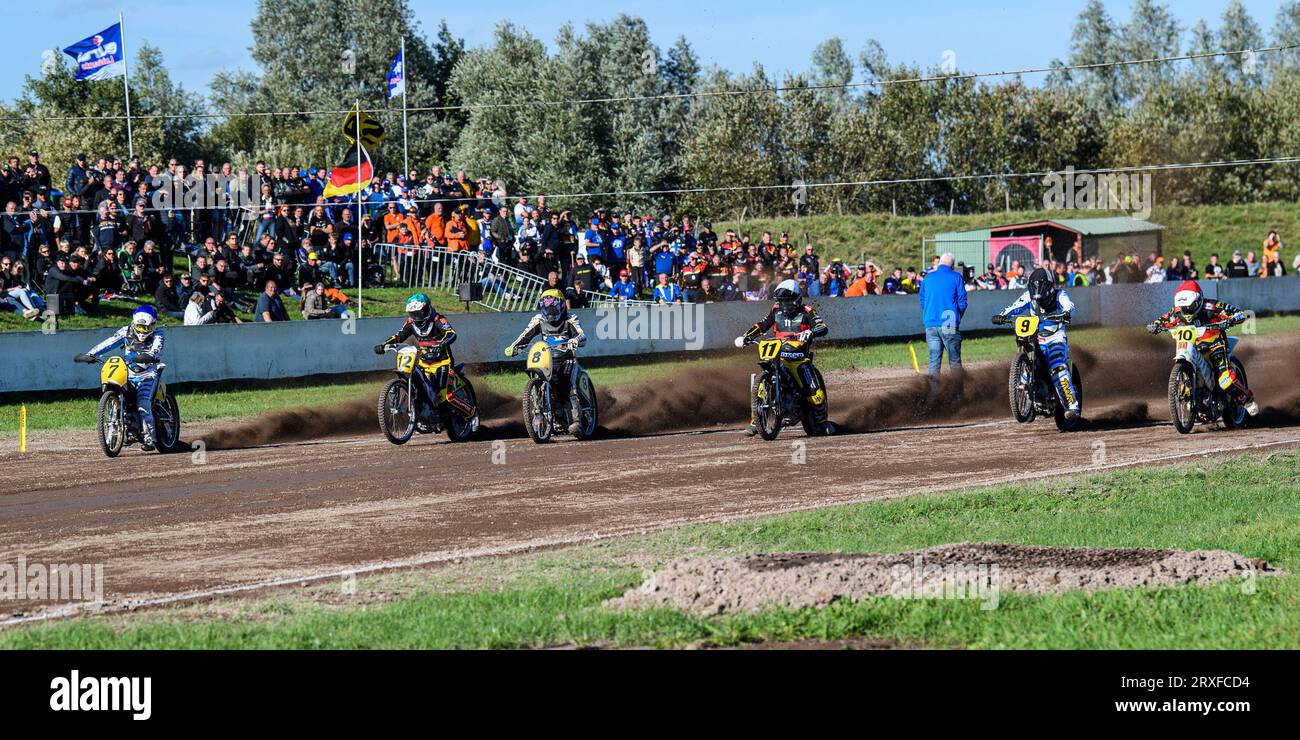 Roden, Netherlands. 24th Sep, 2023. The opening heat as the riders leave the start (L to R) Tero Aarnio (Blue), Jörg Tebbe (Green) Henri Ahlbom (Yellow) Erik Riss (White) Jesse Mustonen (Black & White) Martin Smolinski (Red) during the FIM Long Track Of Nations event at the Speed Centre Roden on Sunday 24th September 2023. (Photo: Ian Charles | MI News) Credit: MI News & Sport /Alamy Live News Stock Photo
