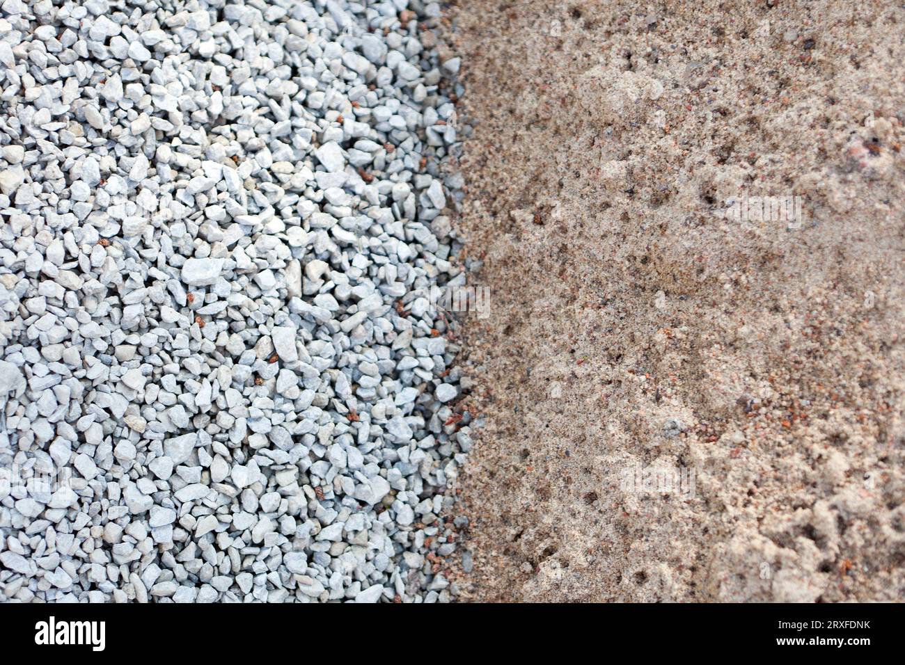 construction materials limeStone and sand background. gravel and macadam. Industrial fraction Crushed gray fines top view Stock Photo
