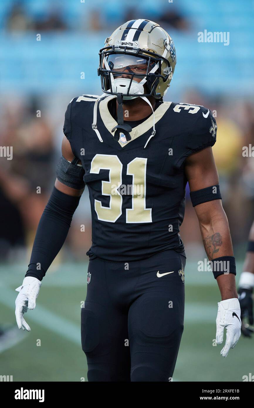 New Orleans, USA. 27th Aug, 2023. New Orleans Saints safety Jordan Howden  (31) tackles Houston Texans running back Dameon Pierce (31) during a  National Football League preseason game at the Caesars Superdome