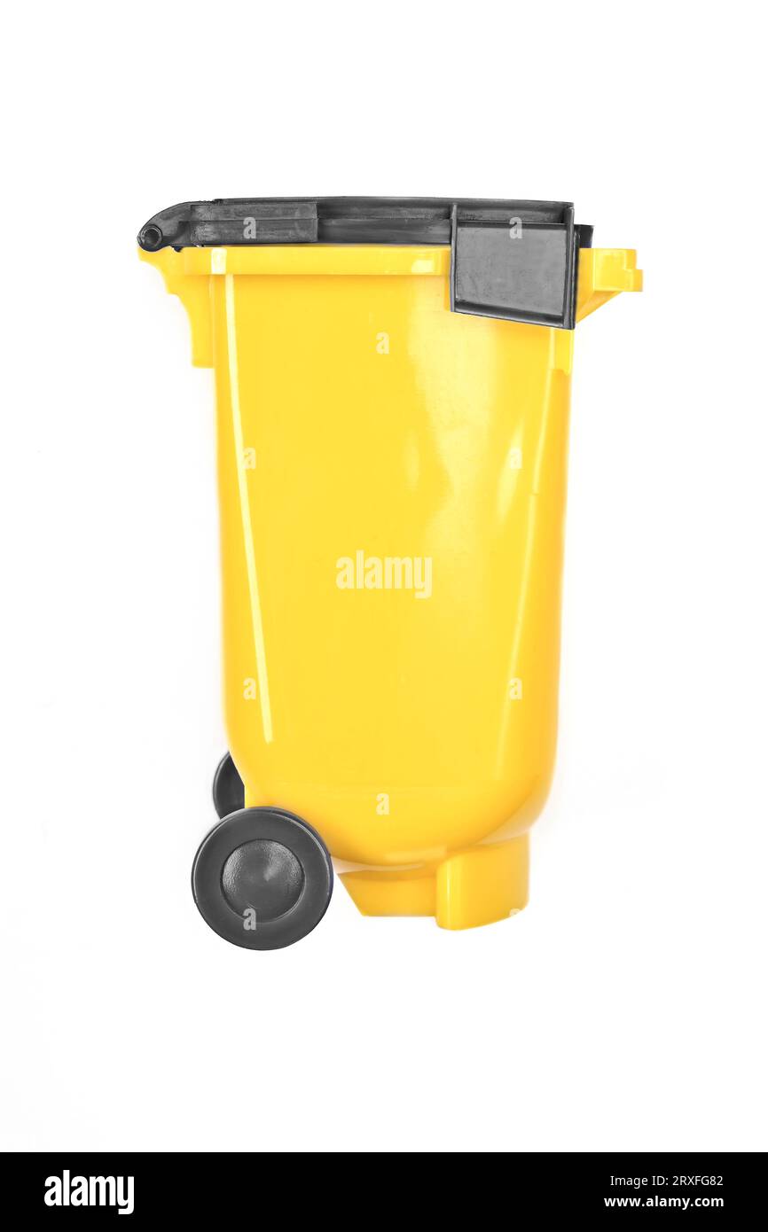 Yellow Recycling Bin with black wheels. Isolated on white background. Stock Photo