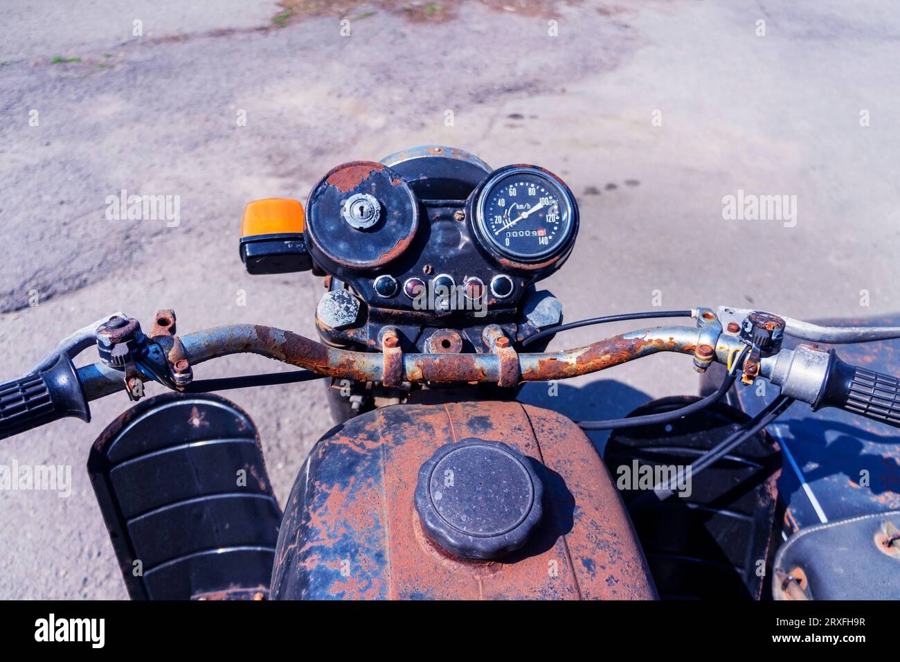 Old rusty motorcycle. Wheel and tank of the vintage motorcycle. Concept ...