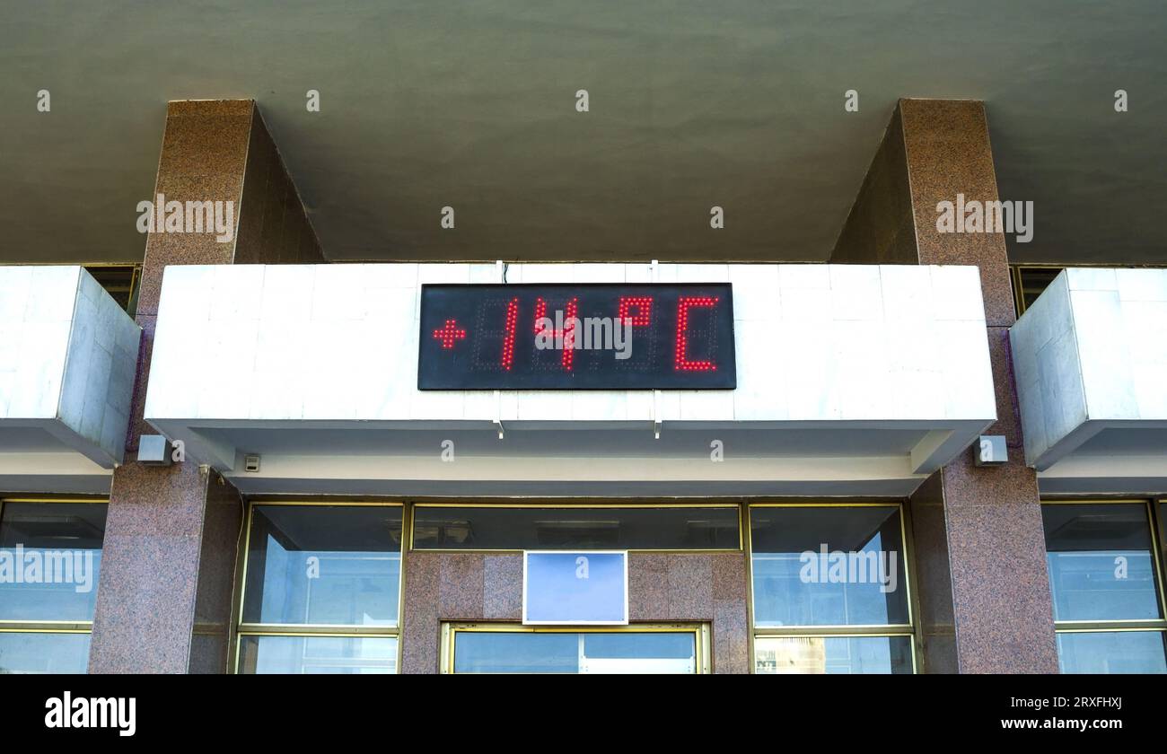 LED DISPLAY on a building facade. LED display shows the temperature