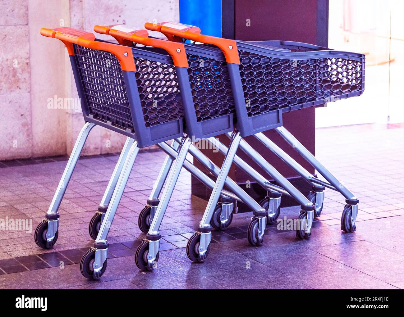 Trolley in the store. carts. Concept buyers, customer, purchaser, shopper, bidder, acquirer Stock Photo