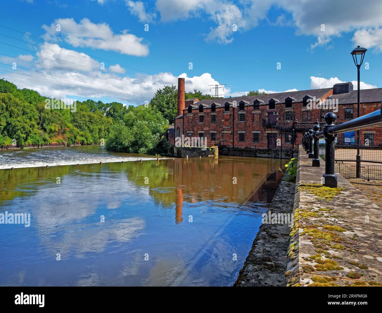 UK, West Yorkshire, Leeds, View of River Aire and Thwaite Mills Watermill. Stock Photo