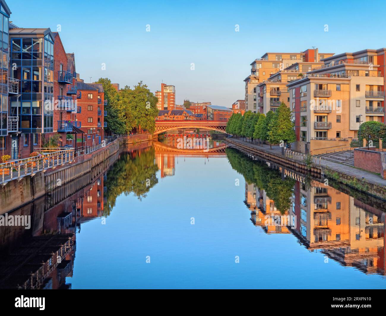 UK, West Yorkshire, Leeds, Crown Point Bridge over the River Aire surrounded by a riverside walk, Office Buildings & Modern Waterfront Apartments. Stock Photo