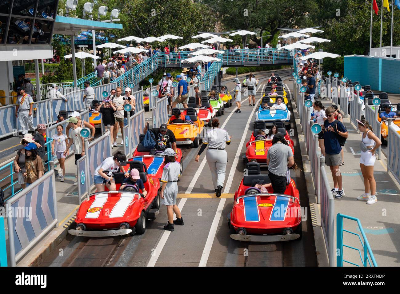 Orlando, USA July 25th, 2023 Visitors at the racing cars ride in