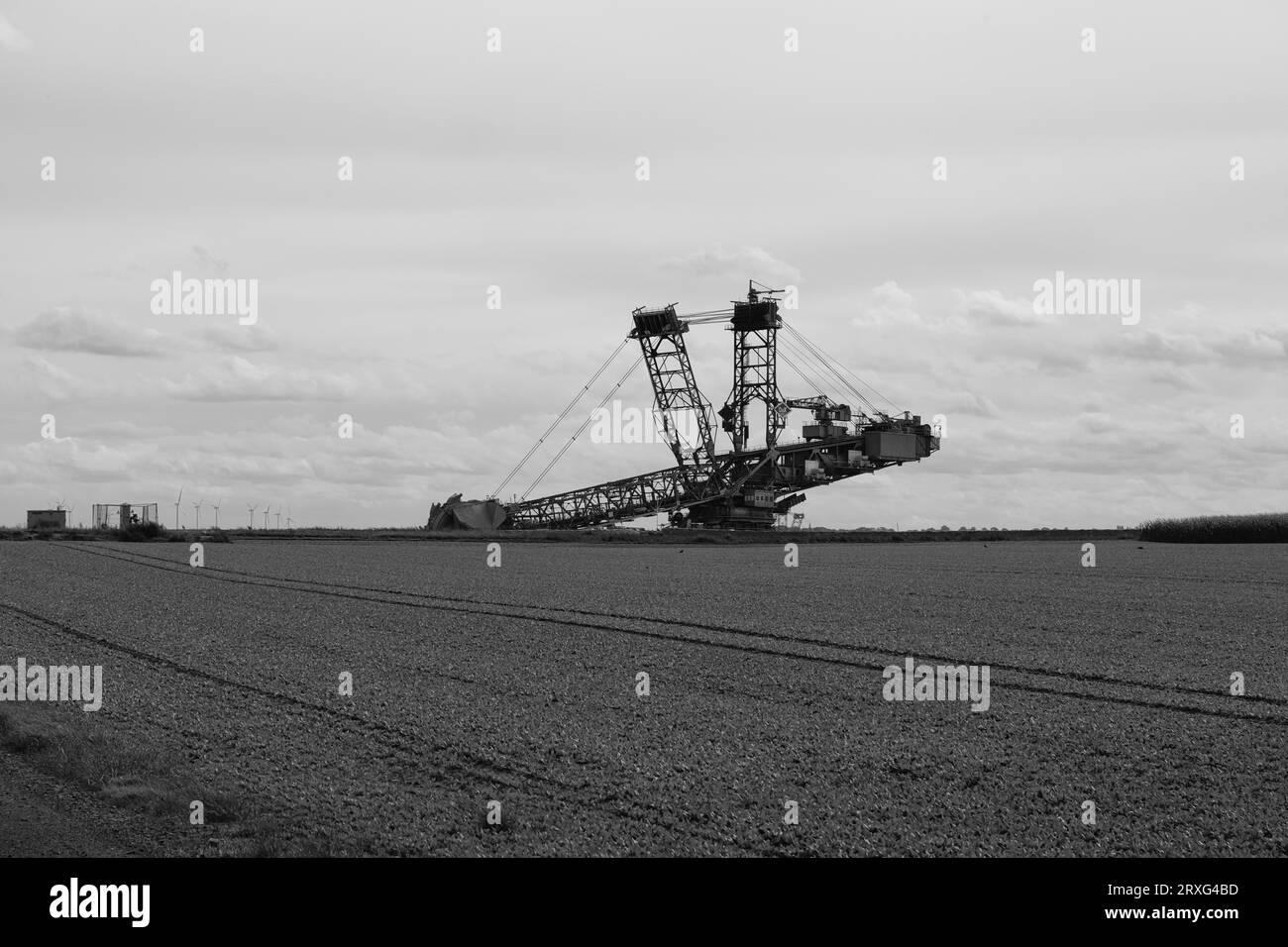 Large excavator on the edge of the Garzweiler opencast lignite mine, black and white, Rhenish lignite mining area, Germany Stock Photo