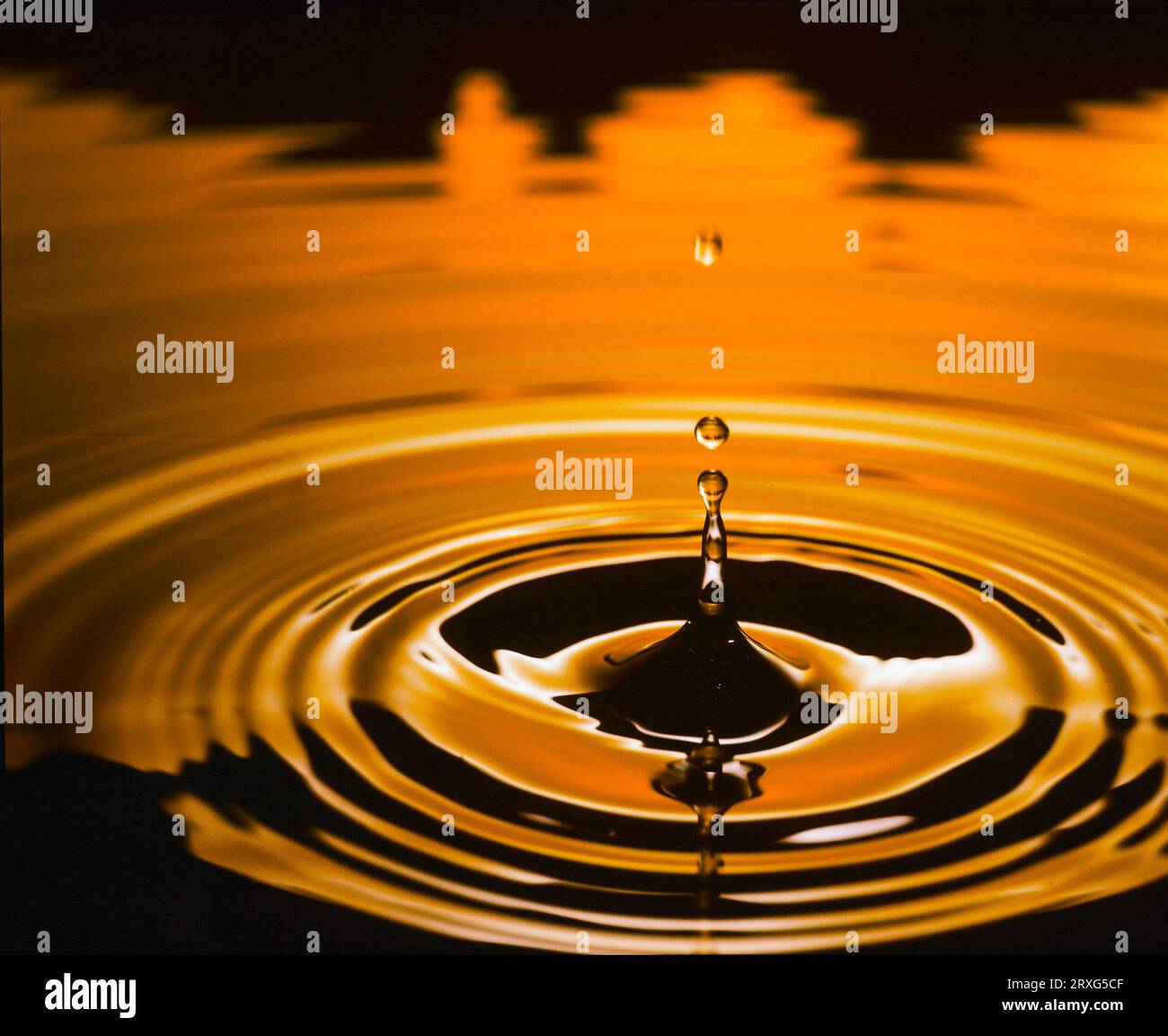 Oil Rings Reflection Falling oil drops with oil rings Stock Photo - Alamy