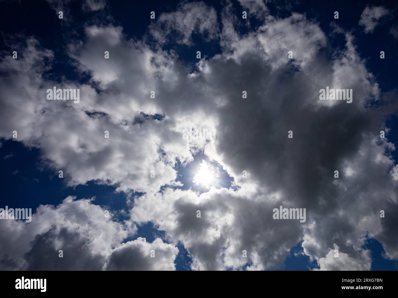Dramatic cloudscape with (cumulus) clouds and sunrays, thunderclouds, rain clouds, Austria Stock Photo
