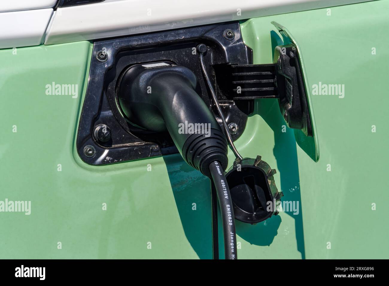 Thessaloniki, Greece September 9 2023 Microlino fully electric plug