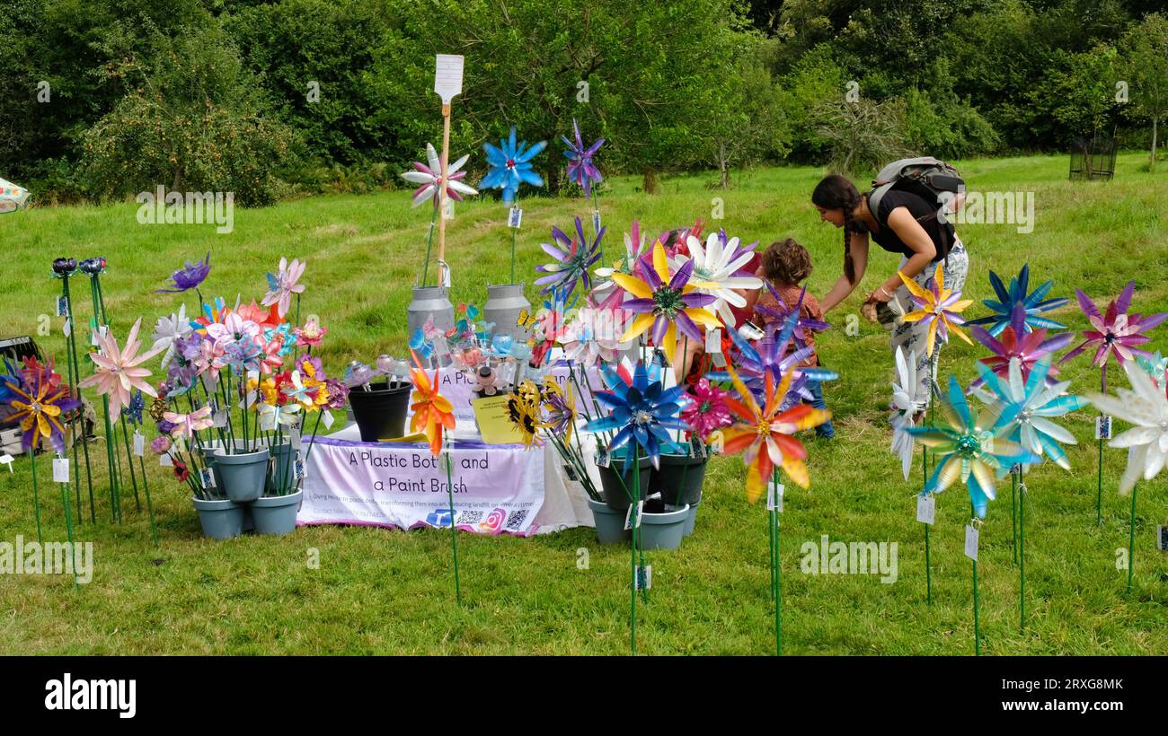 Colourful plastic windmills for sale at a country fete, UK - John Gollop Stock Photo