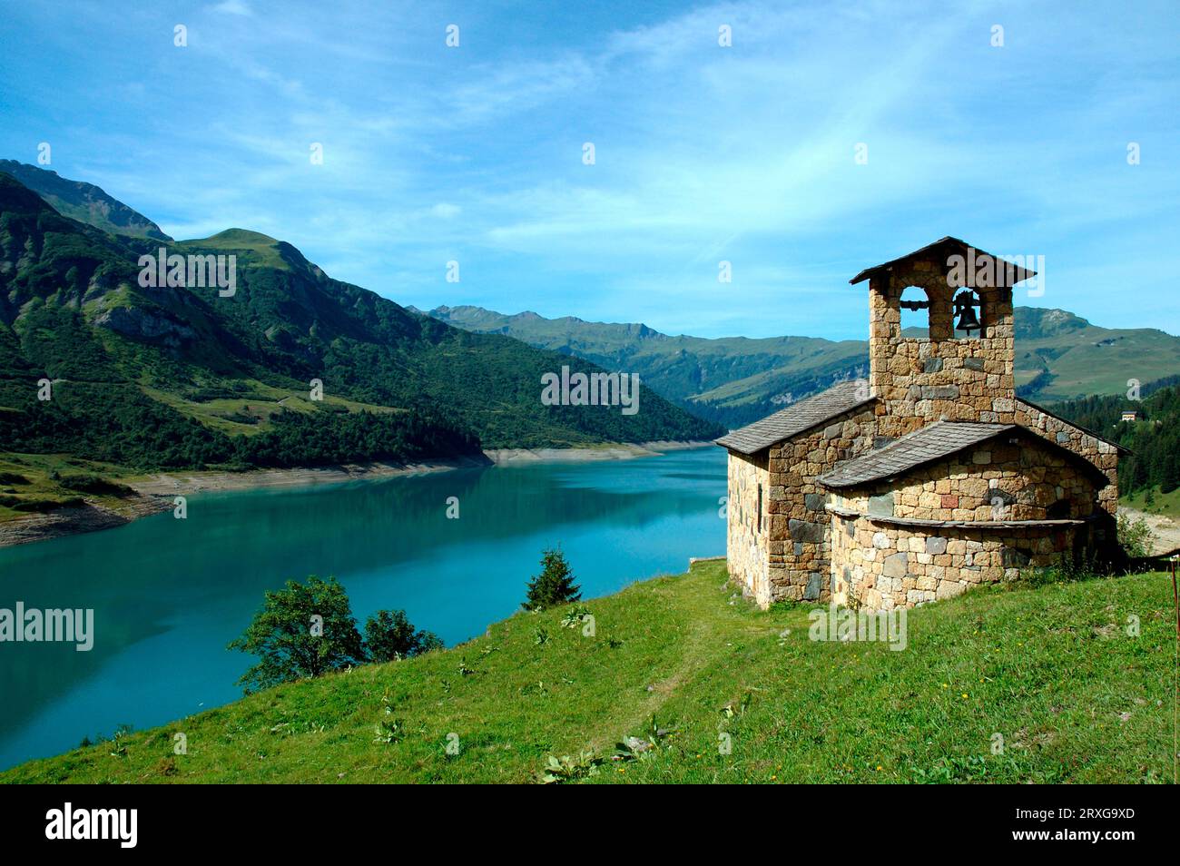 Chapel And Reservoir Lac De Roselend Haute Savoie France Alps Stock Chapel And Reservoir Lac De Roselend Haute Savoie France Alps Stock