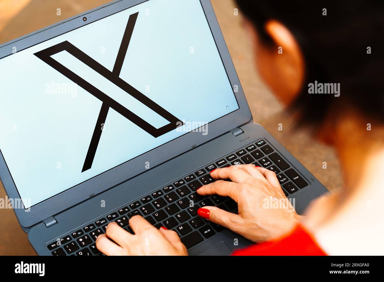 In this photo illustration, the Twitter (X) logo is displayed on a notebook screen. Stock Photo