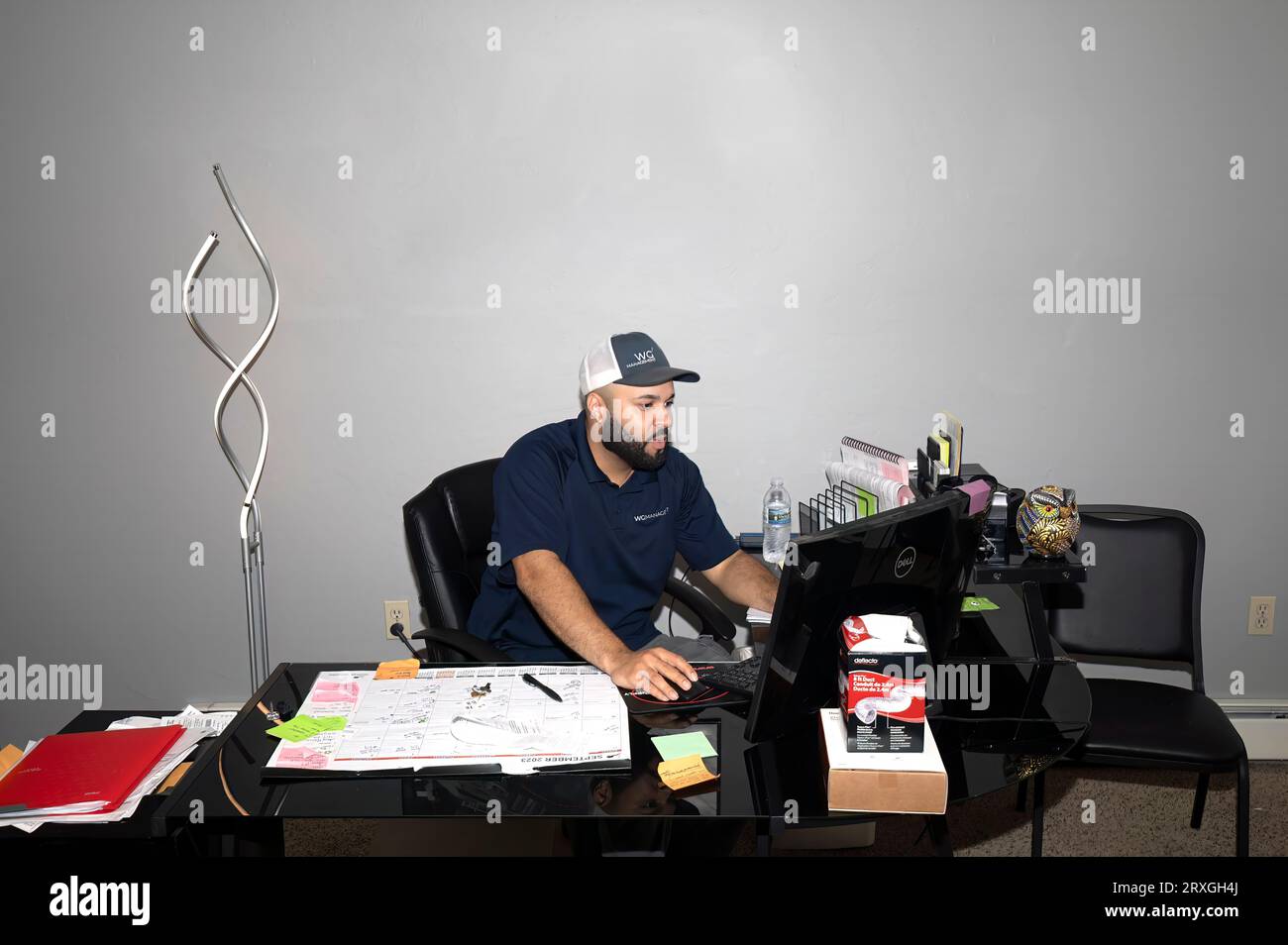 manager working in office on computer. Stock Photo