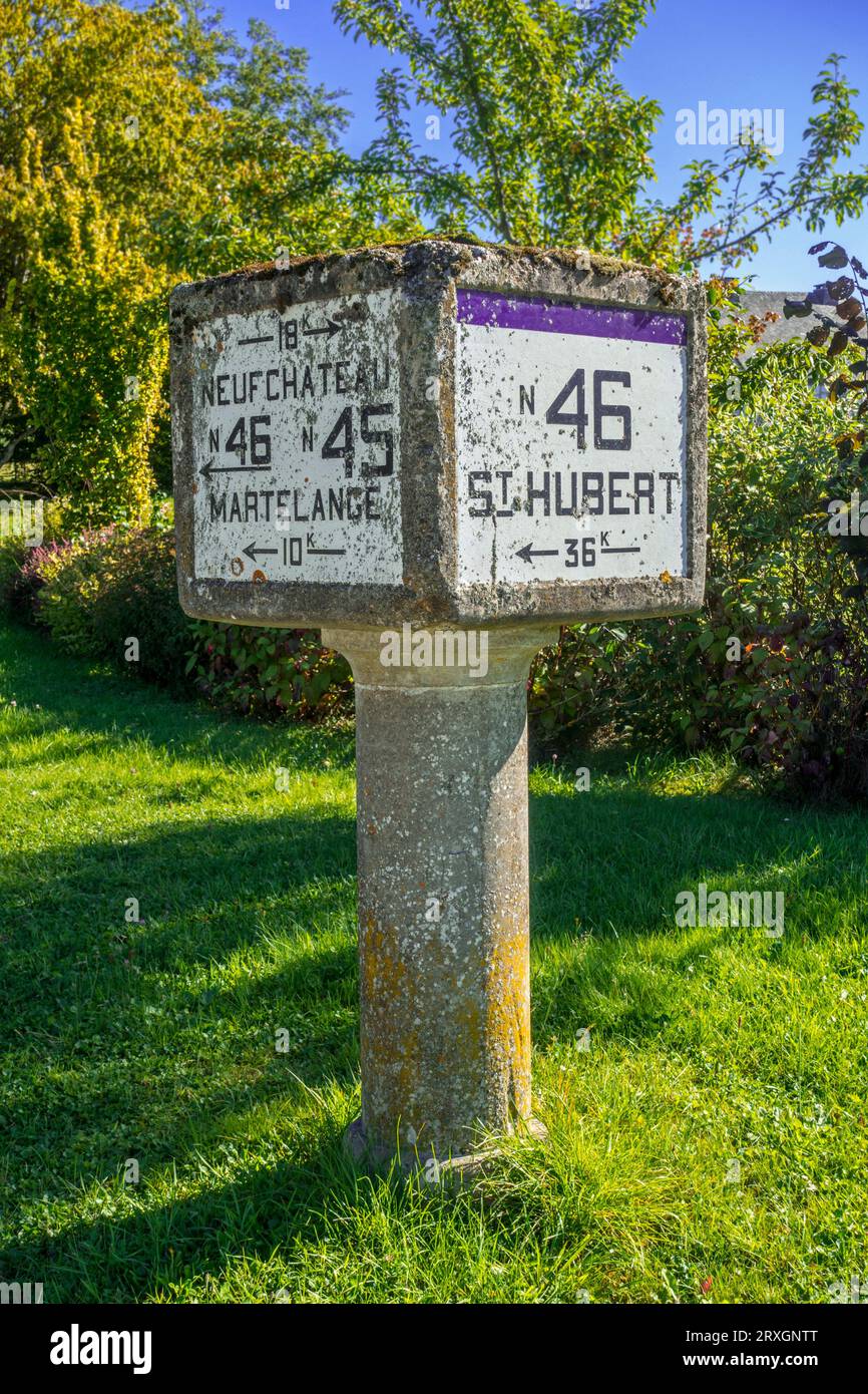 Old road sign / direction sign at open-air museum of Walloon rural life at Saint-Hubert, province of Luxembourg, Belgian Ardennes, Wallonia, Belgium Stock Photo