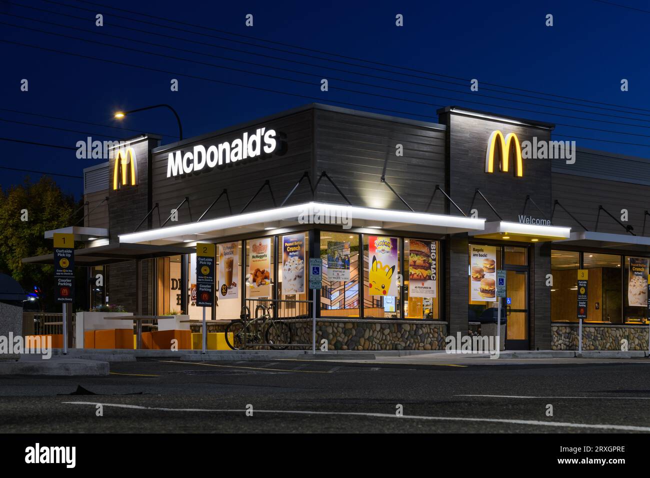 Sultan, WA, USA September 18, 2023; Night view of modern McDonald's