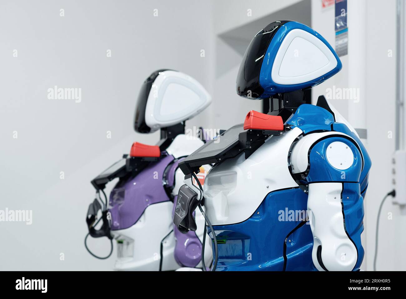 Perm, Russia - July 13, 2023: two humanoid robots guides with medical ...