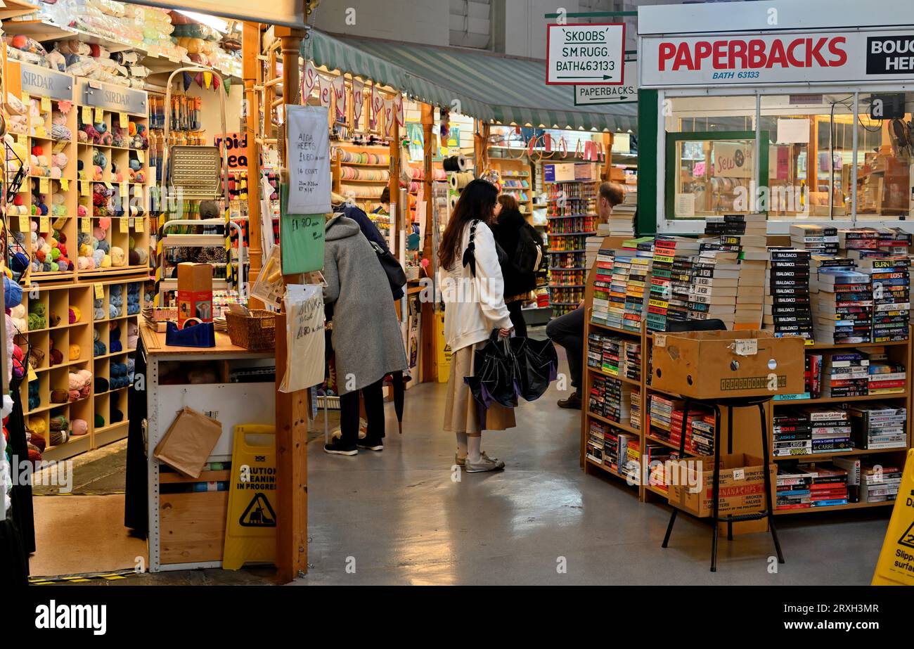 Inside Bath Guildhall Market with both bookstall and sewing centre, Bath, England Stock Photo