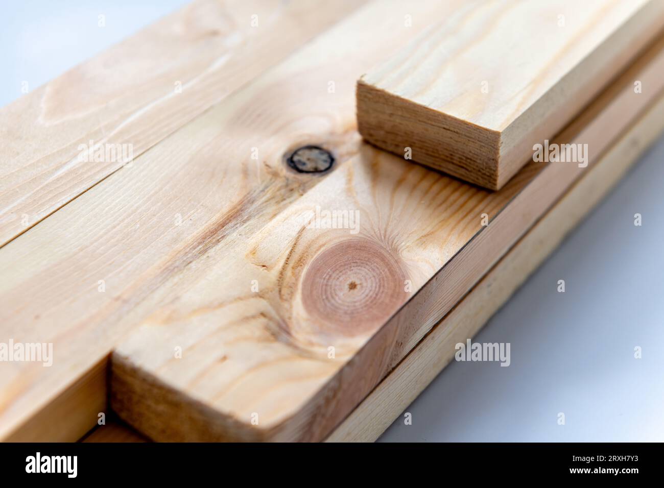 Close up of ready prepared pine wood timber showing two kinds of wood