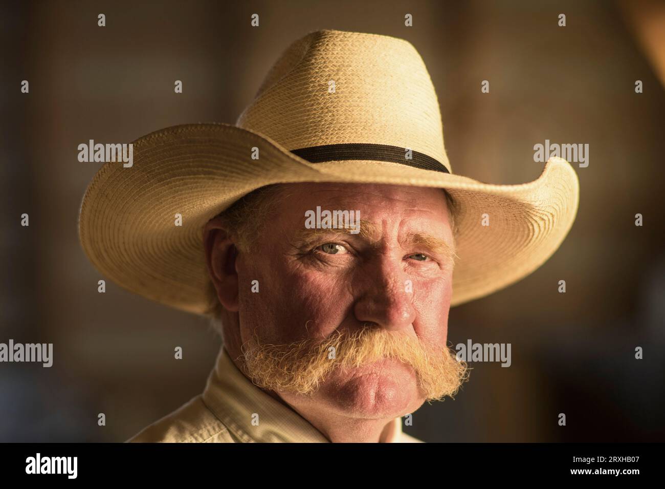 Portrait of a rancher wearing a cowboy hat; Burwell, Nebraska, United States of America Stock Photo