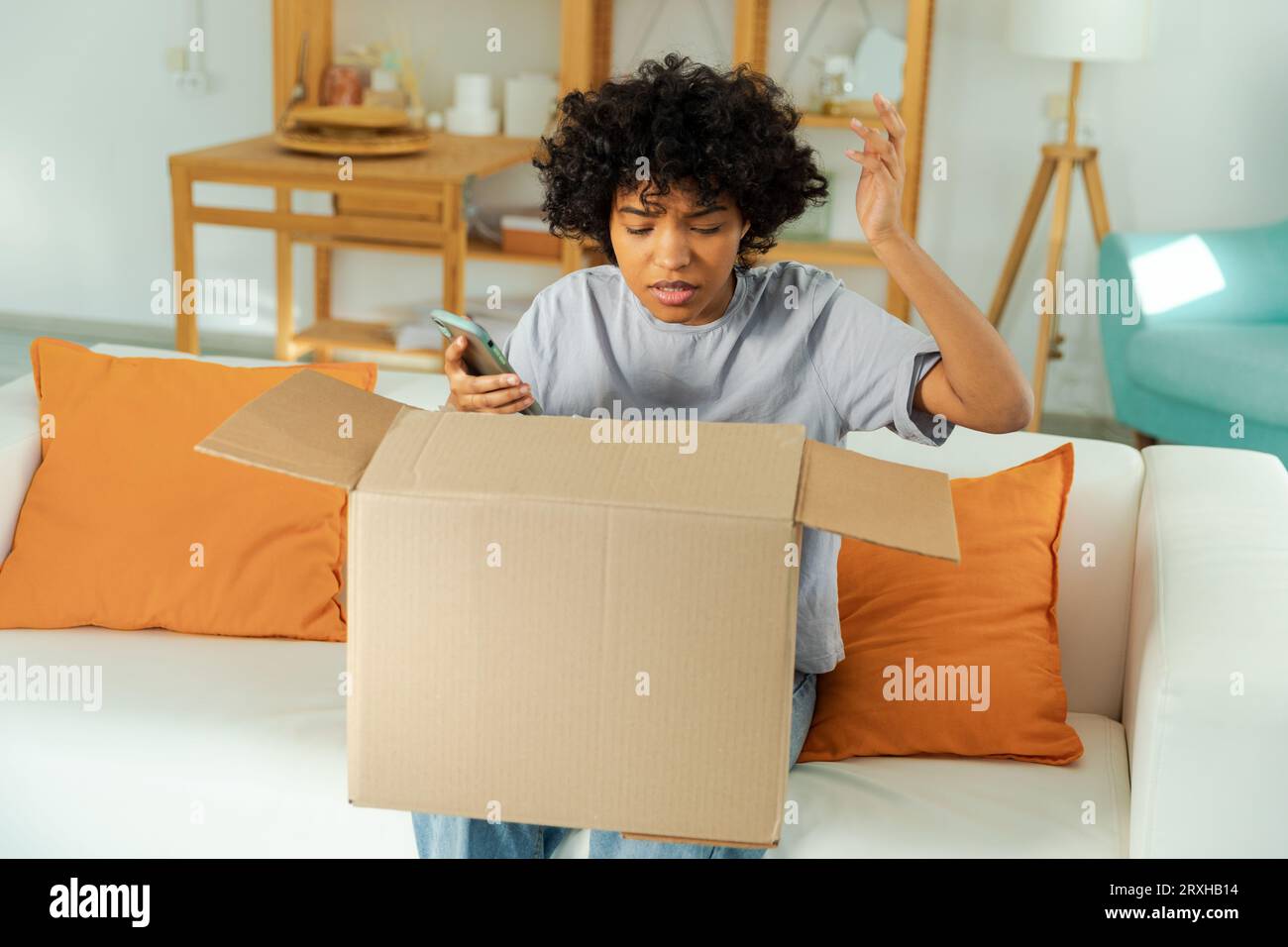 Parcel return unhappy hi-res stock photography and images - Alamy