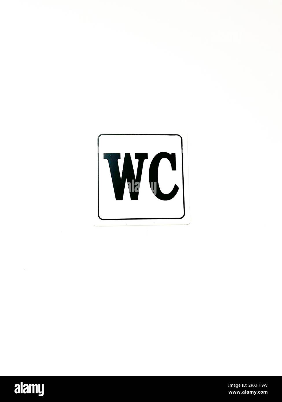 WC pictorial sign on an isolated white background prepared to add text Stock Photo