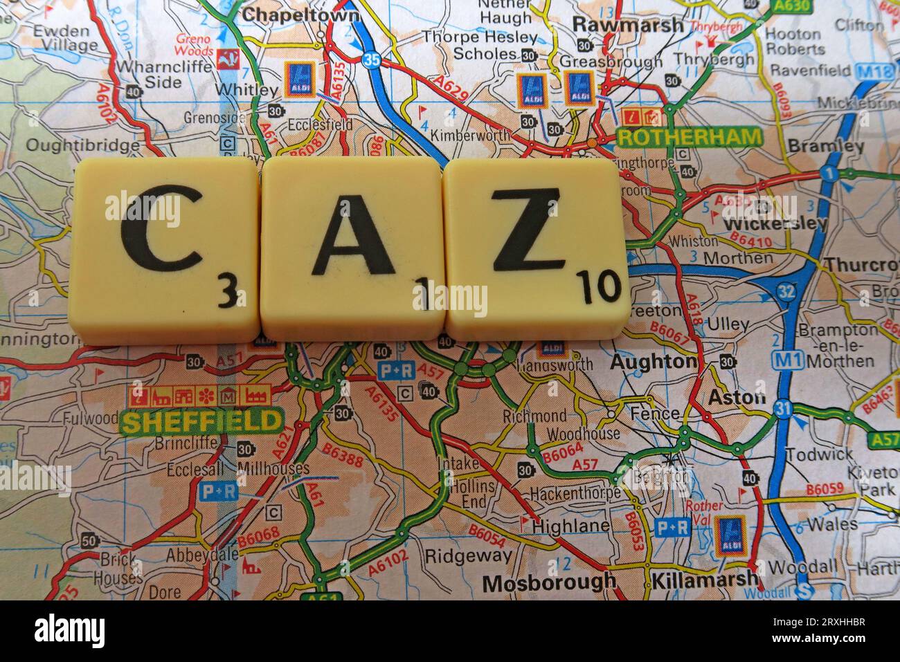 The Sheffield city CAZ Clean Air Zone - in words, Scrabble letters on a map Stock Photo