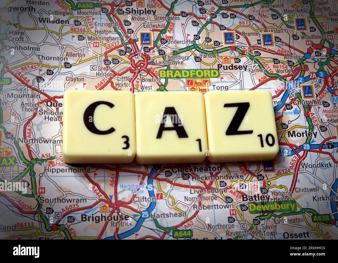 Bradford CAZ Clean Air Zone - in words, Scrabble letters on a map - BD1 1TU Stock Photo