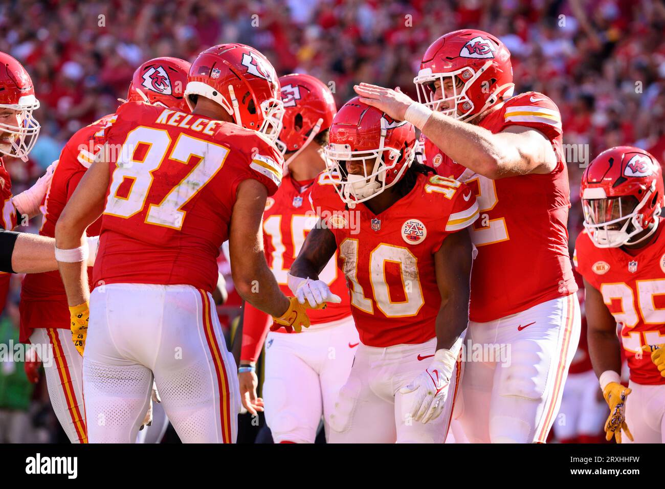 Kansas City Chiefs center Creed Humphrey (52) gets set on the line during  an NFL football