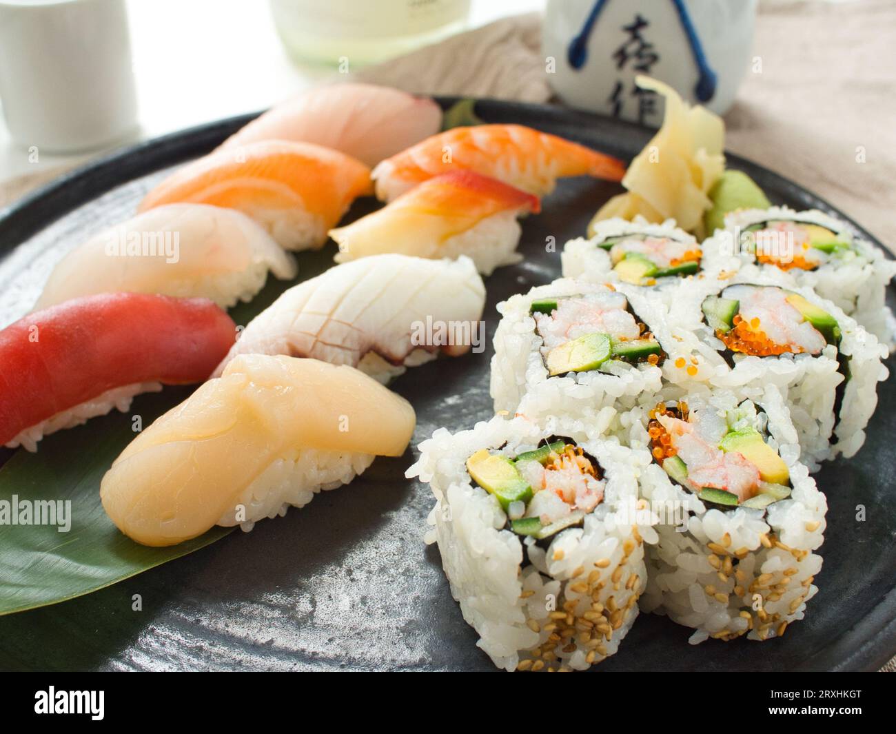 California roll with assorted nigiri sushi at Japanese restaurant. Stock Photo