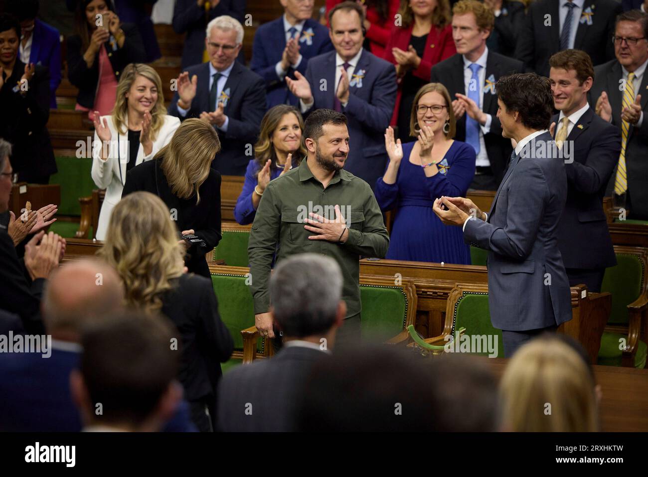 Ottawa, Canada. 22nd Sep, 2023. Ukrainian President Volodymyr Zelenskyy, center, receives a standing ovation from Canadian Prime Minister Justin Trudeau, right, and members of parliament after addressing the House of Commons on Parliament Hill, September 22, 2023 in Ottawa, Canada. Credit: Ukraine Presidency/Ukrainian Presidential Press Office/Alamy Live News Stock Photo