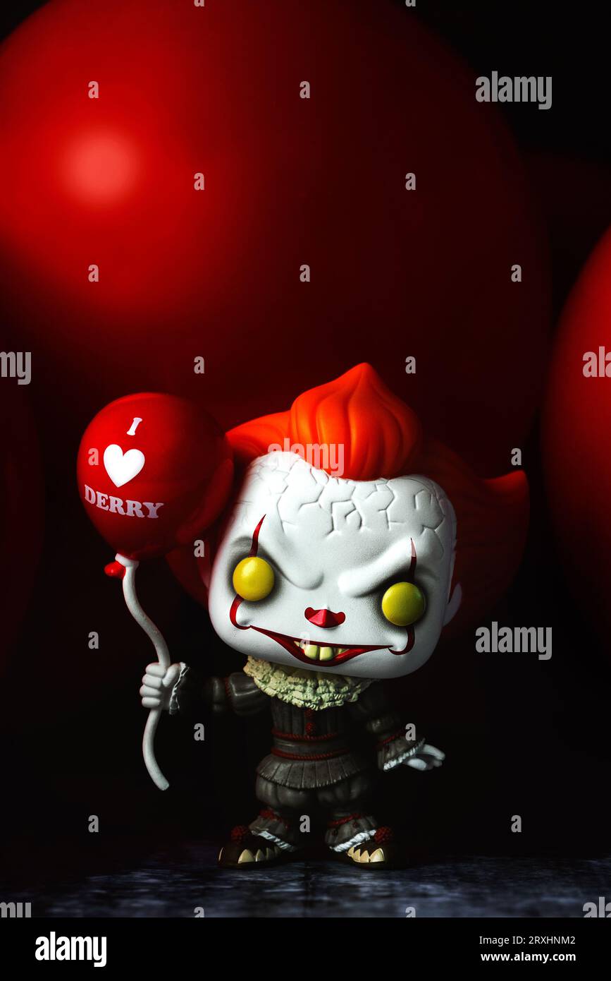 Funko POP vinyl figure of Pennywise with balloon from the movie It. Illustrative editorial of Funko Pop action figure Stock Photo