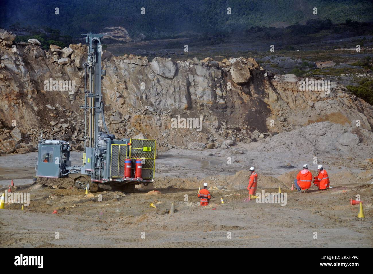 Drilling machine preparing for a blasting session at an open cast coal