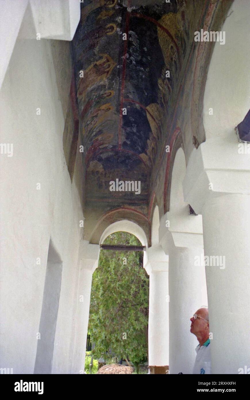 Grecii de Jos, Ialomita County, Romania, approx. 2000. Exterior view of Saint Mary Christian Orthodox church, a historical monument from the 18th century. Fresco on the ceiling of the front porch. Stock Photo
